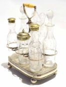 Victorian silver plated seven bottle cruet stand with ivory handle, fitted with some associated