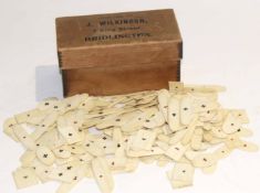 Box by J Wilkinson of Bridlington containing a quantity of bone bridge counters