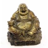 Oriental metal model of a laughing Buddha with Chinese script to base, 11cm high