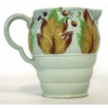 Clarice Cliff Celtic Harvest jug with ribbed body and a floral design above with Clarice Cliff
