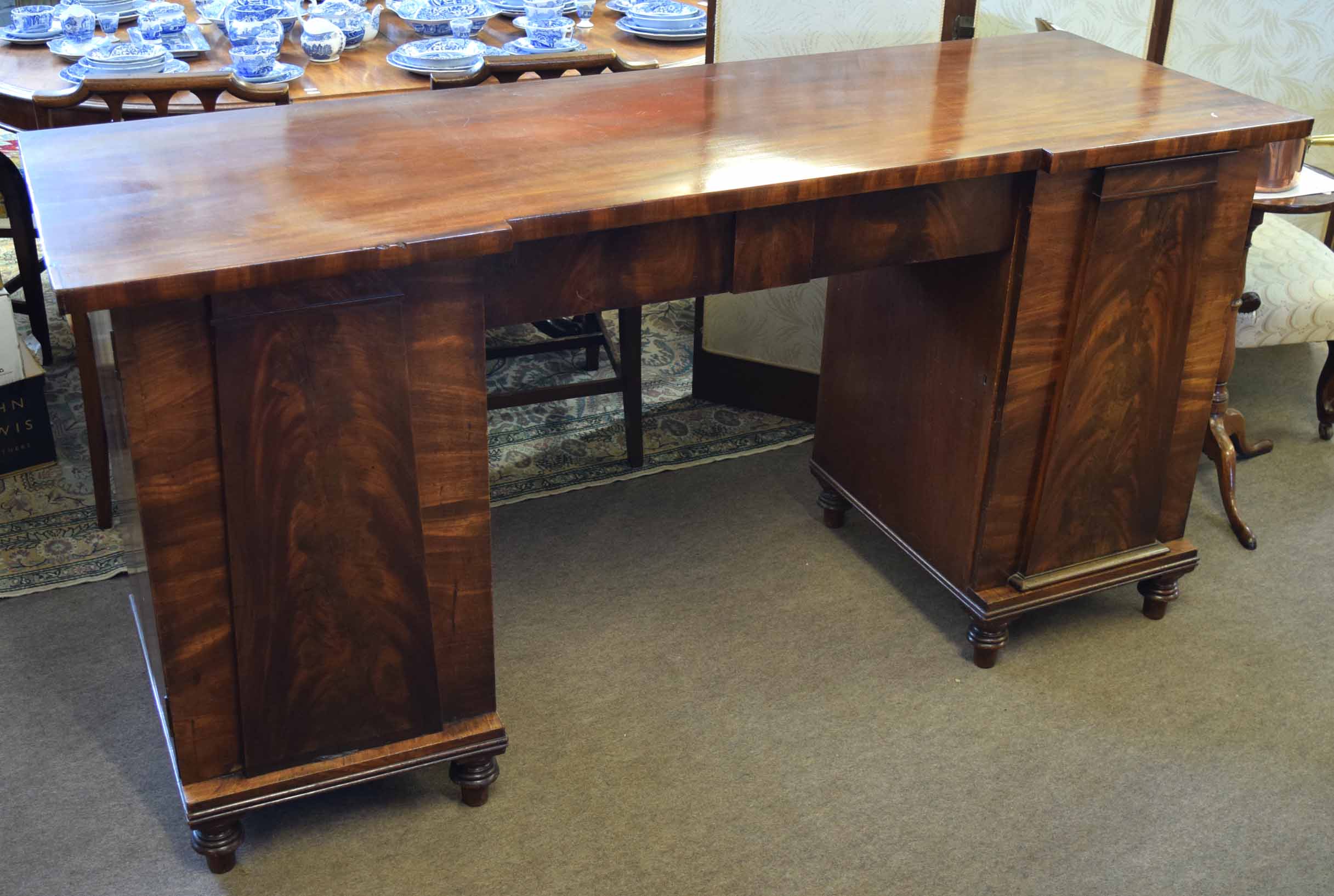 19th century mahogany twin pedestal sideboard, central drawer and the pedestals each fitted with