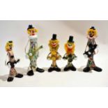Group of Murano type clowns with Murano labels to base of one, all decorated in typical fashion