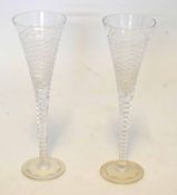 Two Royal Brierly champagne glasses with faceted type design, 27cm high