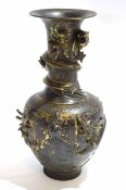 Chinese bronze vase with tapered neck, the body with applied decoration of a sinuous dragon