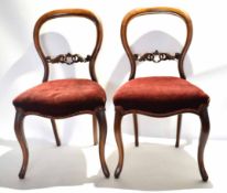 Set of four Victorian mahogany balloon back dining chairs with burgundy upholstered seats and