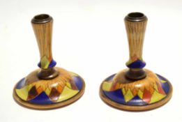 Pair of circa 1930s turned sycamore wood squat candlesticks with diamond painted decoration, 12cm