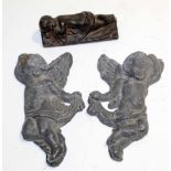 Two lead cast angels and a further cast model of a cherub asleep (3)