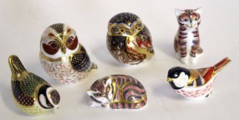 Collection of Royal Crown Derby paperweights with either silver or gold insets, modelled as