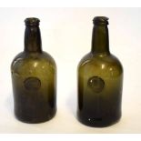 Pair of early 19th century bottles both with the seal for Sir Will Strickland, date 1809, 26cm high