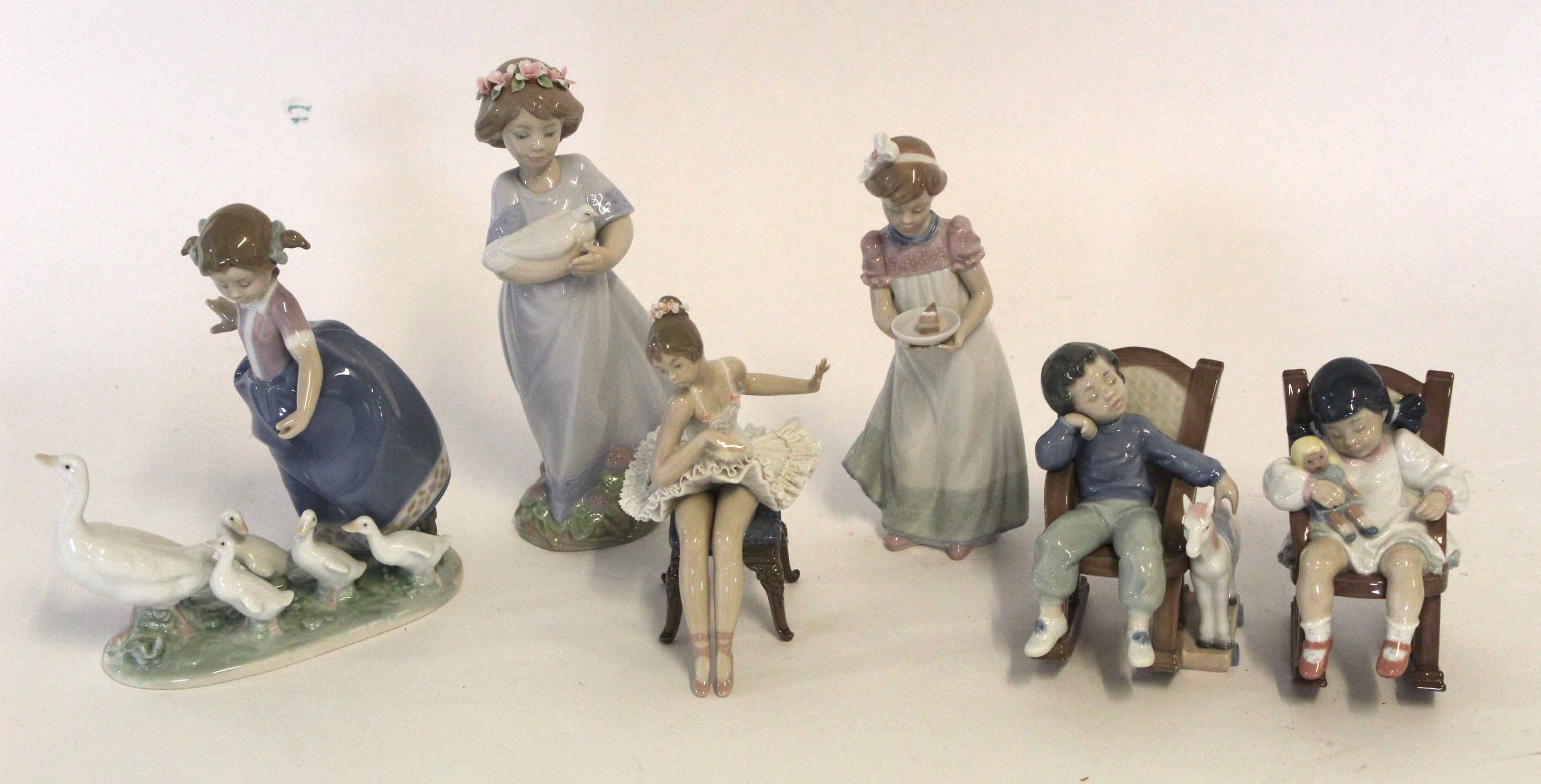 Group of Lladro figures in original boxes including Tierna, Nina Conduciendo, Nina Con Tarta and 3