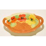 Clarice Cliff shallow dish, shape 534, decorated with the Nasturtium pattern, with two reticulated