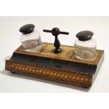 Tonbridge inlaid ink stand fitted with two circular inkwells with ebonised lids and a T-bar ebonised