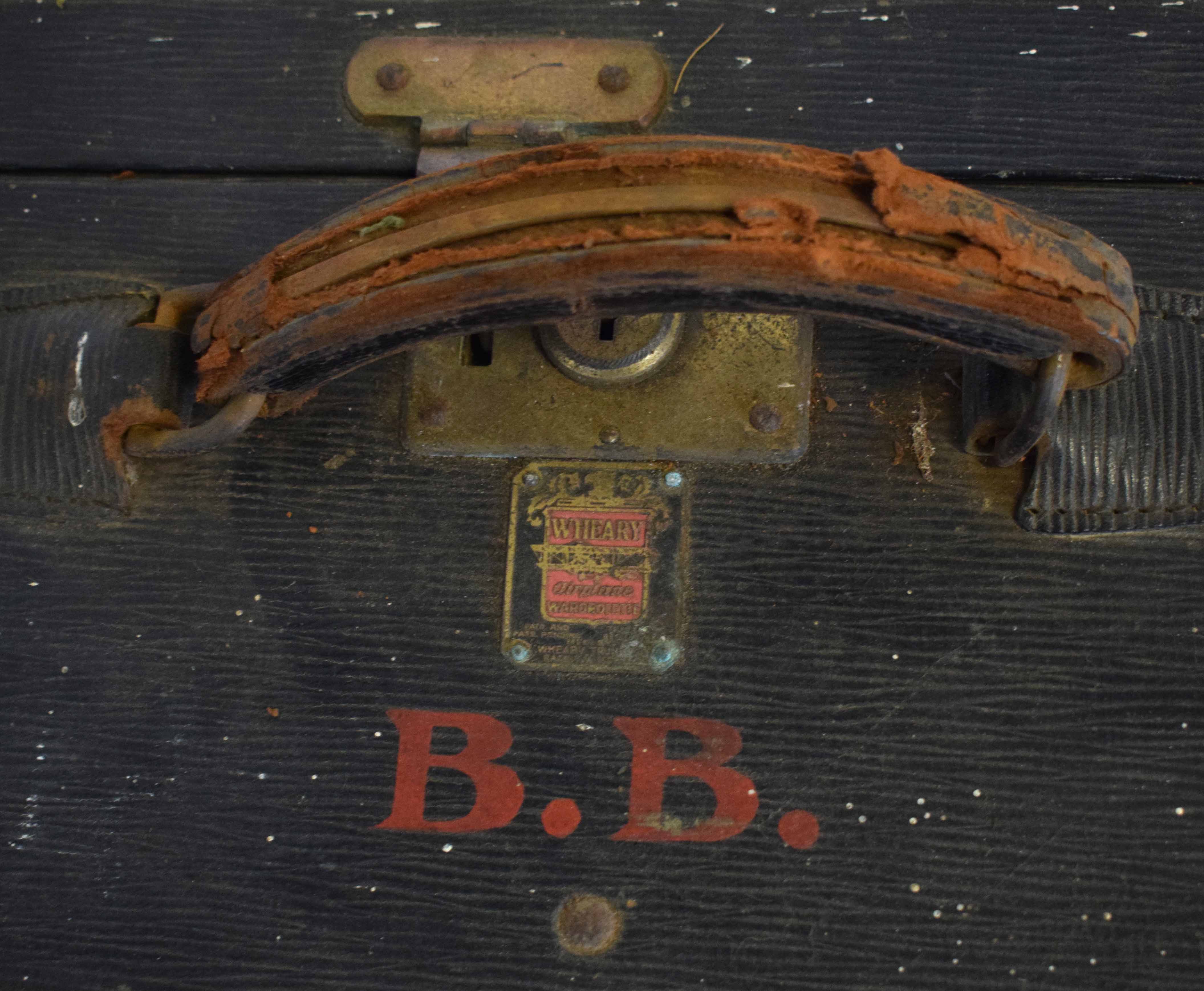 Vintage suitcase with various labels and leather handle with metal fixtures - Image 2 of 2