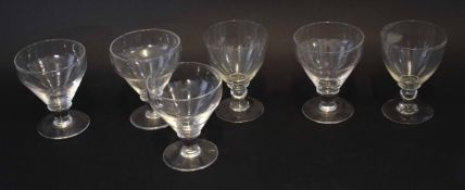 Group of six 19th century glass rummers, the ogee bowls supported above blown stems of various