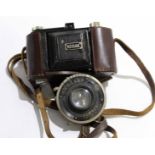 Kodak camera in original leather case, together with a Kodak Compur lens