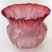 Late 19th century cranberry glass oil lamp shade with a floral design and crimped rim