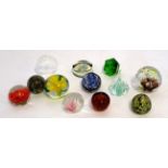 Assortment of ten modern glass paperweights, decorated in various colours (11)