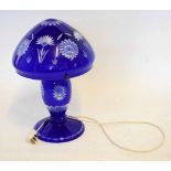 Blue glass lamp and shade with floral design