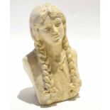 Resin bust of a young girl with braided hair and ribbons, signed to reverse E. Halsey, 19cm tall