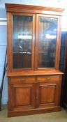 Late 19th century mahogany bookcase cabinet, glazed top, two drawers over panelled doors enclosing