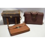 Leather carrying case together with two further leather attache cases (3)