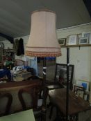 OAK FRAMED TURNED COLUMN STANDARD LAMP WITH PUCE SHADE AND CIRCULAR BASE