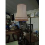 OAK FRAMED TURNED COLUMN STANDARD LAMP WITH PUCE SHADE AND CIRCULAR BASE