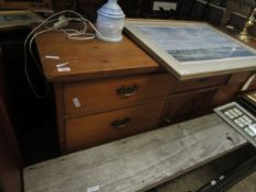 VICTORIAN WAXED PINE DRESSER BASE FITTED WITH SEVEN DRAWERS OVER A PANELLED CUPBOARD DOOR WITH BRASS