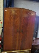 REPRODUCTION MAHOGANY ARCH TOP DOUBLE DOOR WARDROBE WITH TWO FULL WIDTH DRAWERS TO BASE RAISED ON