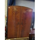 REPRODUCTION MAHOGANY ARCH TOP DOUBLE DOOR WARDROBE WITH TWO FULL WIDTH DRAWERS TO BASE RAISED ON