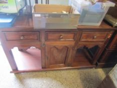 EASTERN HARDWOOD DRESSER BASE WITH THREE DRAWERS WITH CENTRAL CUPBOARD DOOR WITH OPEN SHELVES AND