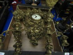 GOOD QUALITY BRASS CLOCK GARNITURE, THE TOP MOUNTED WITH CAVALRY MAN WITH FIVE BRANCH