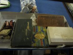 BOX CONTAINING MIXED AUTOGRAPH BOOKS, SILVER PLATED SPOONS, A SILVER CIGARETTE CASE, SILVER PLATED