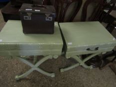 PAIR OF GREEN PAINTED BOOK FORMED BEDSIDE TABLES ON X-FRAME STRETCHERS