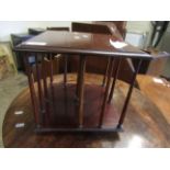 TEAK FRAMED TABLE TOP REVOLVING BOOKCASE