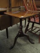 A GEORGIAN MAHOGANY SQUARE TOP WINE TABLE WITH TURNED COLUMN ON A TRIPOD BASE