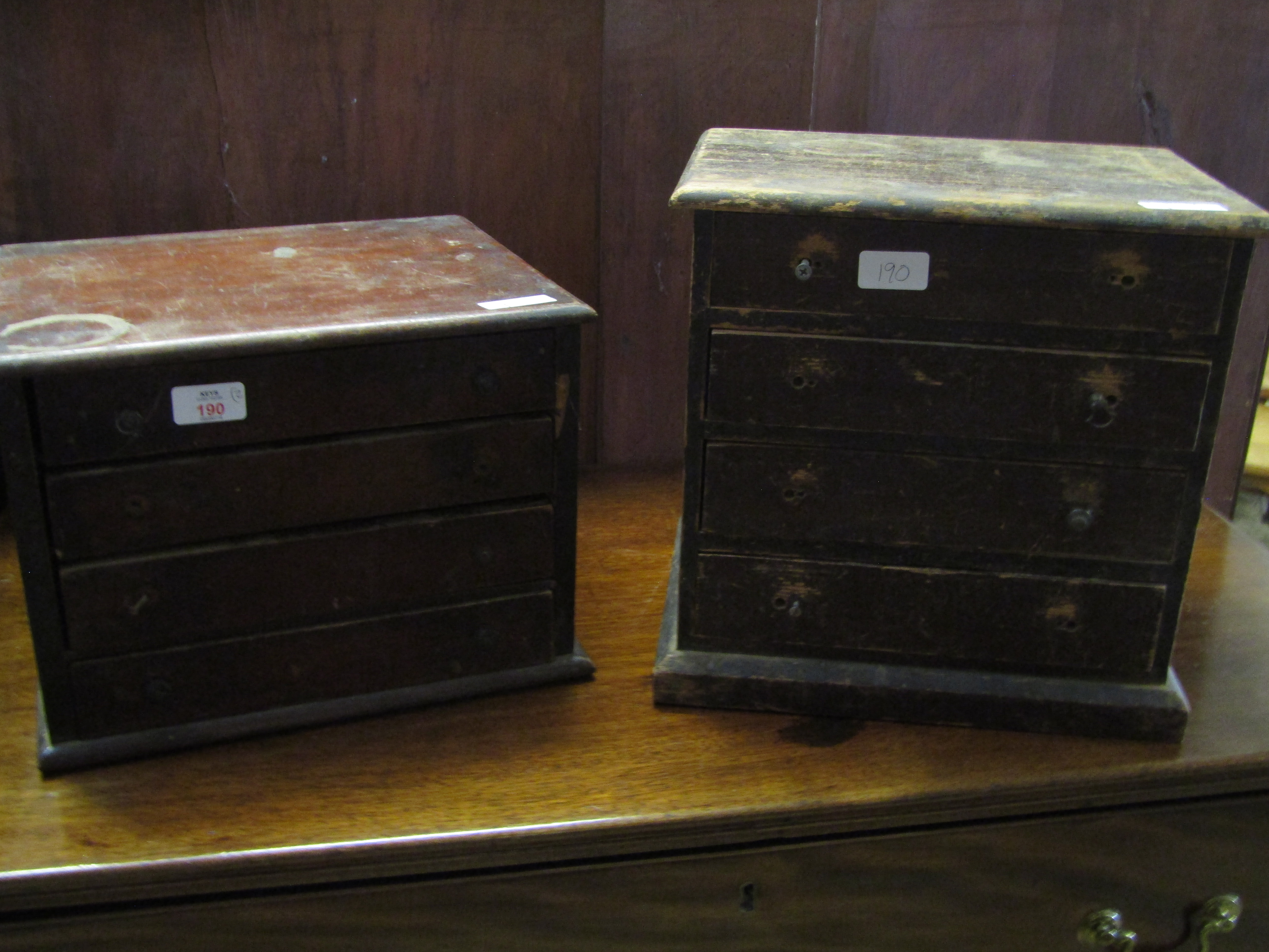 MAHOGANY FRAMED TABLE TOP FOUR DRAWER COLLECTORS CHEST TOGETHER WITH A FURTHER PINE FRAME FOUR