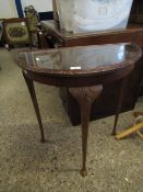 TEAK FRAMED DEMI LOOM SIDE TABLE RAISED ON THREE PAD LEGS WITH GLASS TOP