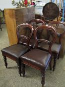 SET OF FOUR 19TH CENTURY MAHOGANY BALLOON BACK DINNING CHAIRS WITH BROWN REXINE UPHOLSTERED SEATS