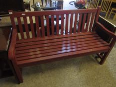 RED PAINTED SLATED SEATED AND BACK THREE SEATER GARDEN BENCH