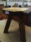 ELM TOPPED RUSTIC THREE FOOTED STOOL