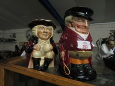 TONY WOOD CHARACTER JUG AARON TOGETHER WITH A ROYAL DOULTON JUG OF THE HUNTSMAN (2)