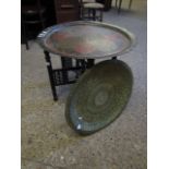 FOLDING BIARNAISE TYPE TABLE TOGETHER WITH AN ETCHED BRASS TRAY AND ONE OTHER (3)