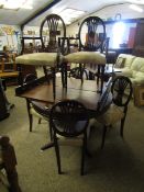 GOOD QUALITY REPRODUCTION CIRCULAR EXTENDING DINNING TABLE WITH TWO EXTRA LEAVES TOGETHER WITH A SET