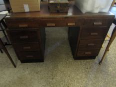 OAK FRAMED TWIN PEDESTAL DESK FITTED WITH NINE DRAWERS