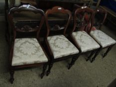 SET OF FOUR VICTORIAN MAHOGANY BALLOON BACK CHAIRS WITH CARVED RAIL AND CREAM DROP IN SEATS ON