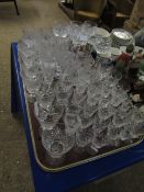 TRAY CONTAINING A PART SUITE OF GOOD QUALITY CUT CRYSTAL WINE GLASSES