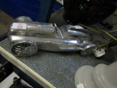 CHROMIUM MODEL OF A RACE CAR, TOGETHER WITH A VICTORIAN TYPE SIDE LAMP