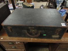 VINTAGE SUITCASE WITH VARIOUS LABELS AND LEATHER HANDLE WITH METAL FIXTURES