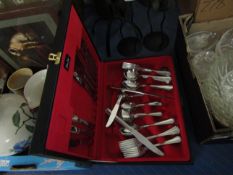 BOX CONTAINING MIXED STAINLESS STEEL CUTLERY TOGETHER WITH THREE METAL CANDLE STANDS